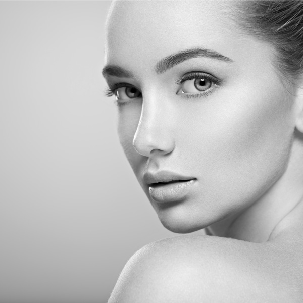 woman looking over her shoulder